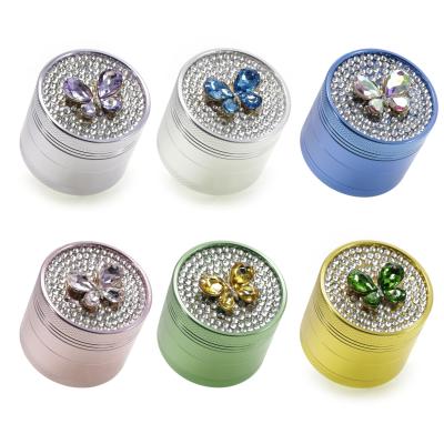 Colored butterfly smoke grinder 50020004